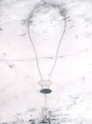 A One of a Kind Statement Necklace featuring Quartz Crystals set in Sterling Silver, handmade by Tribe Jewelry Designer Sarah Lewis.  