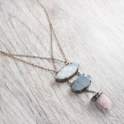 A One of a Kind Statement Necklace featuring a Drusy Quartz and Amethyst Spirit Quartz Crystals set in Oxidized Sterling Silver, handmade by Tribe Jewelry Designer Sarah Lewis.  