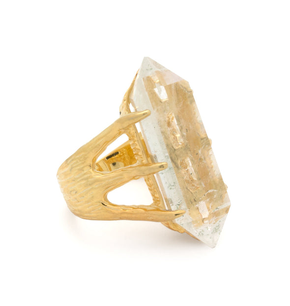 A Bohemian style statement ring featuring a quartz crystal set in 16K Gold Plated Brass, by Tribe Jewelry Designer Sarah Lewis.