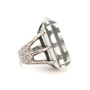 A Bohemian style statement ring featuring a Quartz Crystal set in oxidized Sterling Silver, by Tribe Jewelry Designer Sarah Lewis.