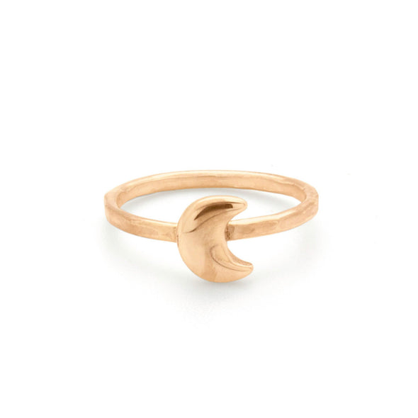 A bohemian style, gold plated stacking ring featuring a tiny crescent moon on a hammered band, by Tribe Jewelry Designer Sarah Lewis.