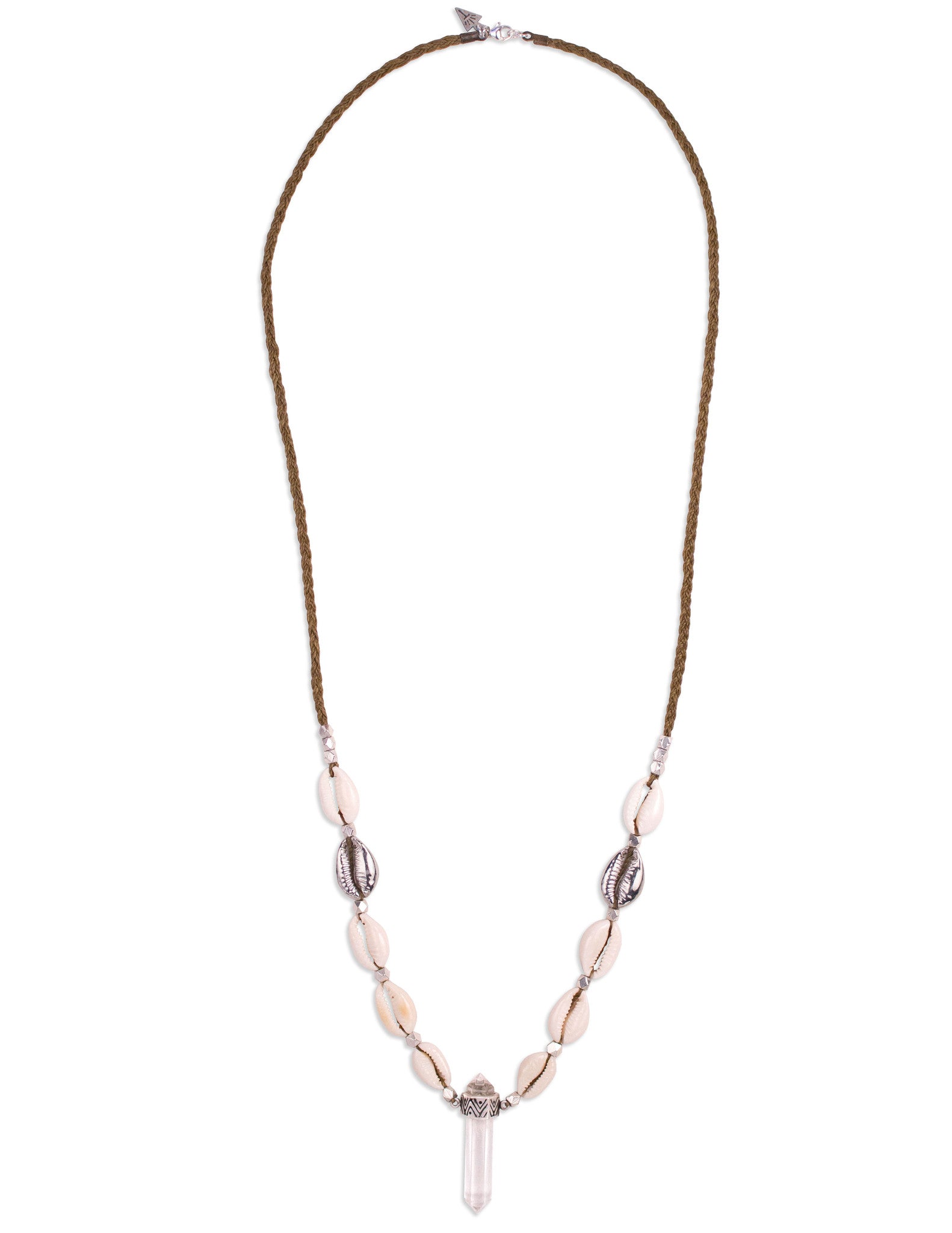 A Quartz Crystal set in engraved Sterling Silver, hangs with natural and cast Cowrie shells, and Silver beads, on a long, Bohemian Statement Necklace, handmade by Tribe Jewelry Designer Sarah Lewis. 
