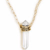 A Bohemian style Gold Plated, Quartz Crystal Pendant Necklace featuring a carved, geometric pattern on setting, handmade by Tribe Jewelry Designer Sarah Lewis. 