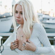A Sterling Silver Necklace, featuring a Quartz Crystal Pendant with carved geometric pattern on setting. 