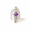 A bohemian style statement ring featuring an amethyst stone set in sterling silver, with carved geometric sri yantra design, by Tribe Jewelry Designer Sarah Lewis.