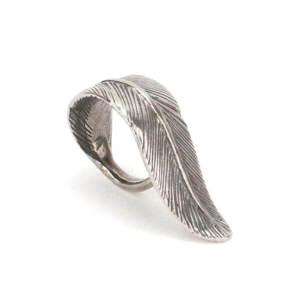 A Bohemian style statement ring featuring a feather design carved in sterling silver, by Tribe Jewelry Designer Sarah Lewis.