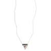 A sterling silver necklace, featuring a faceted, smokey quartz gemstone, in a triangular pendant, handmade by Tribe Jewelry Designer Sarah Lewis. 