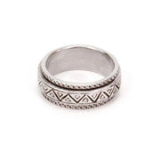 Sterling silver spinner ring with carved geometric pattern, by designer Sarah Lewis. 