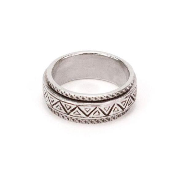 Sterling silver spinner ring with carved geometric pattern, by designer Sarah Lewis. 